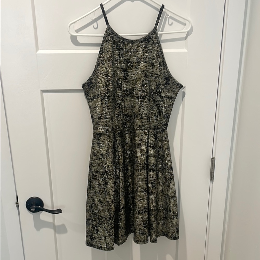 Chic Black and Metallic Mini Dress - size M